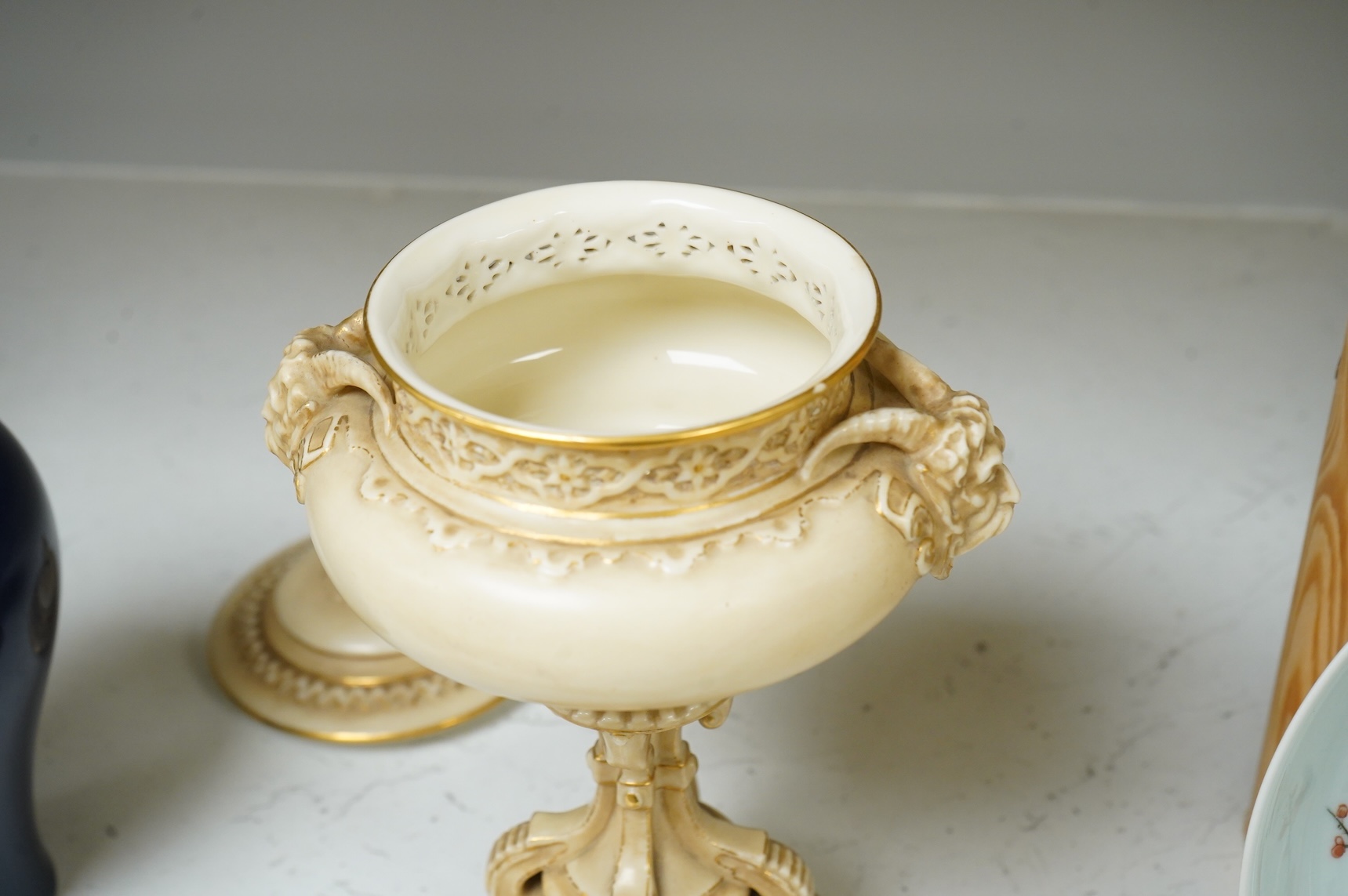 A late Victorian Royal Worcester porcelain pot pourri and cover, numbered 139 to base, 25cm